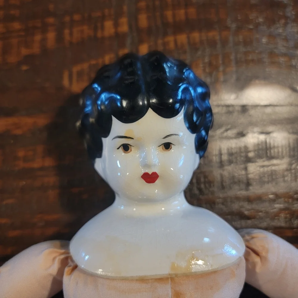 Beautiful Vintage China Head Doll rare brown eyes & pale face 15in‎